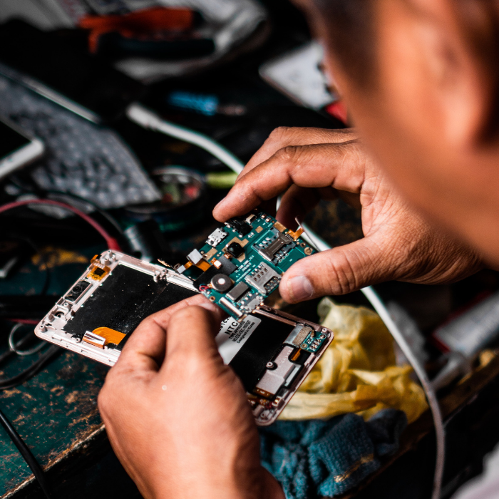 Engineer Repairing a printer